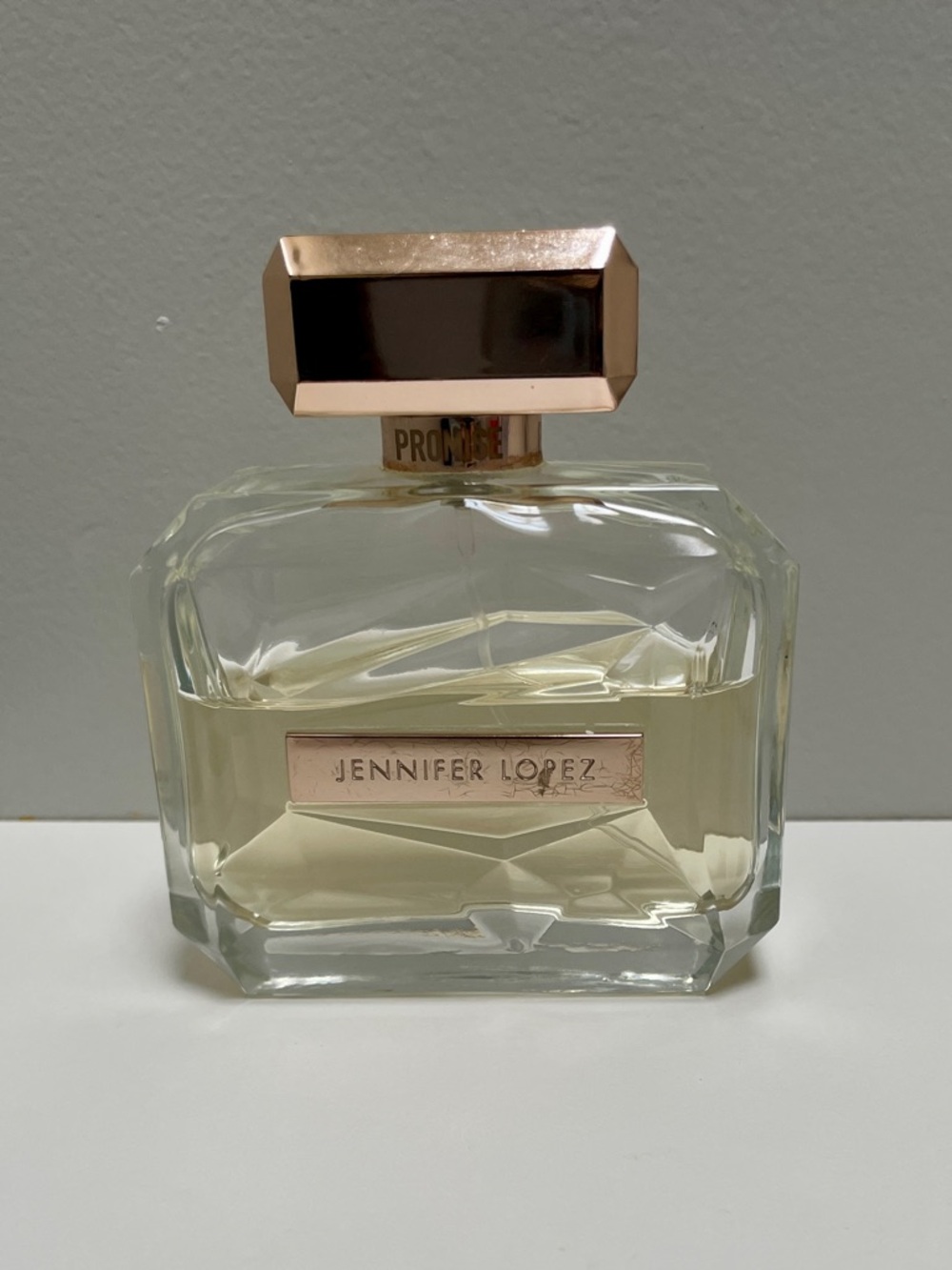 Jennifer Lopez-Promise-Perfume Bottle 3.4 oz 
Clear Glass with Rose Gold Accents